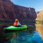 Lone Female Kayaker Heading Down Colorado River in AZ